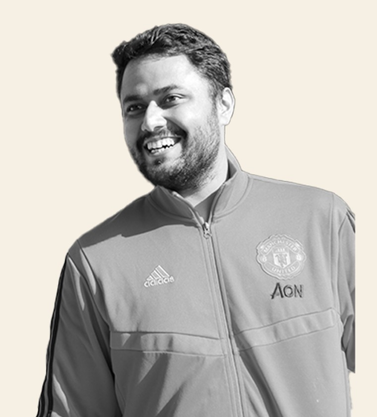 Arjun Tejani smiling in a portrait photo